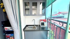 Studio Luxe, balcon, vue ville | Cuisine privée