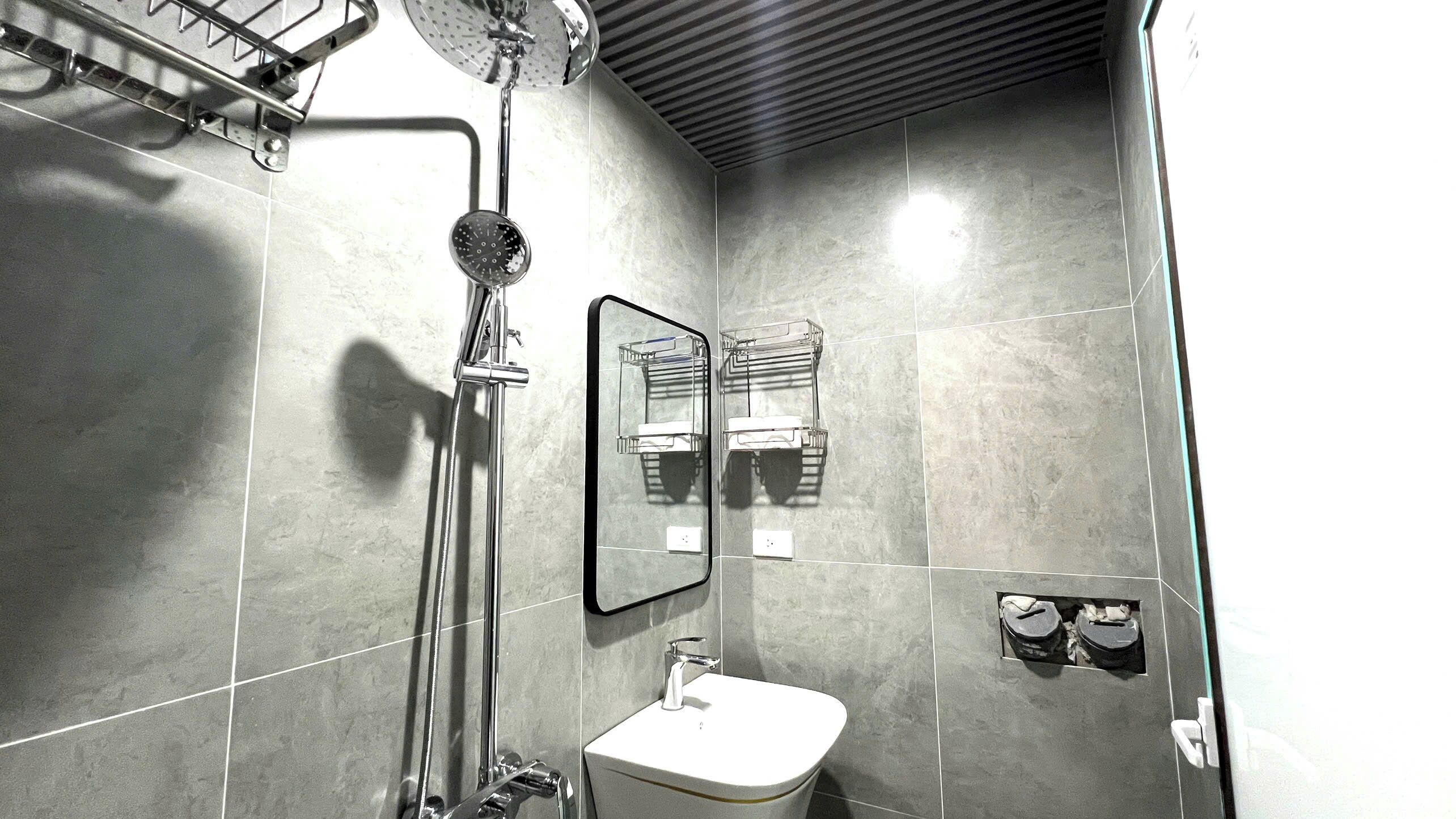 Deluxe Studio, Balcony, City View | Bathroom | Shower, hair dryer, slippers, towels