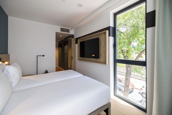 Twin Room, 2 Twin Beds | In-room safe, desk, blackout drapes, soundproofing - Spark By Hilton Madrid Alcala (Madrid)