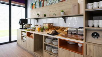 Daily buffet breakfast (EUR 15 per person)