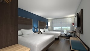 A hotel room with two beds, a desk, a chair, a TV, and a window with a city view. - Tru By Hilton Joliet Plainfield (Joliet)