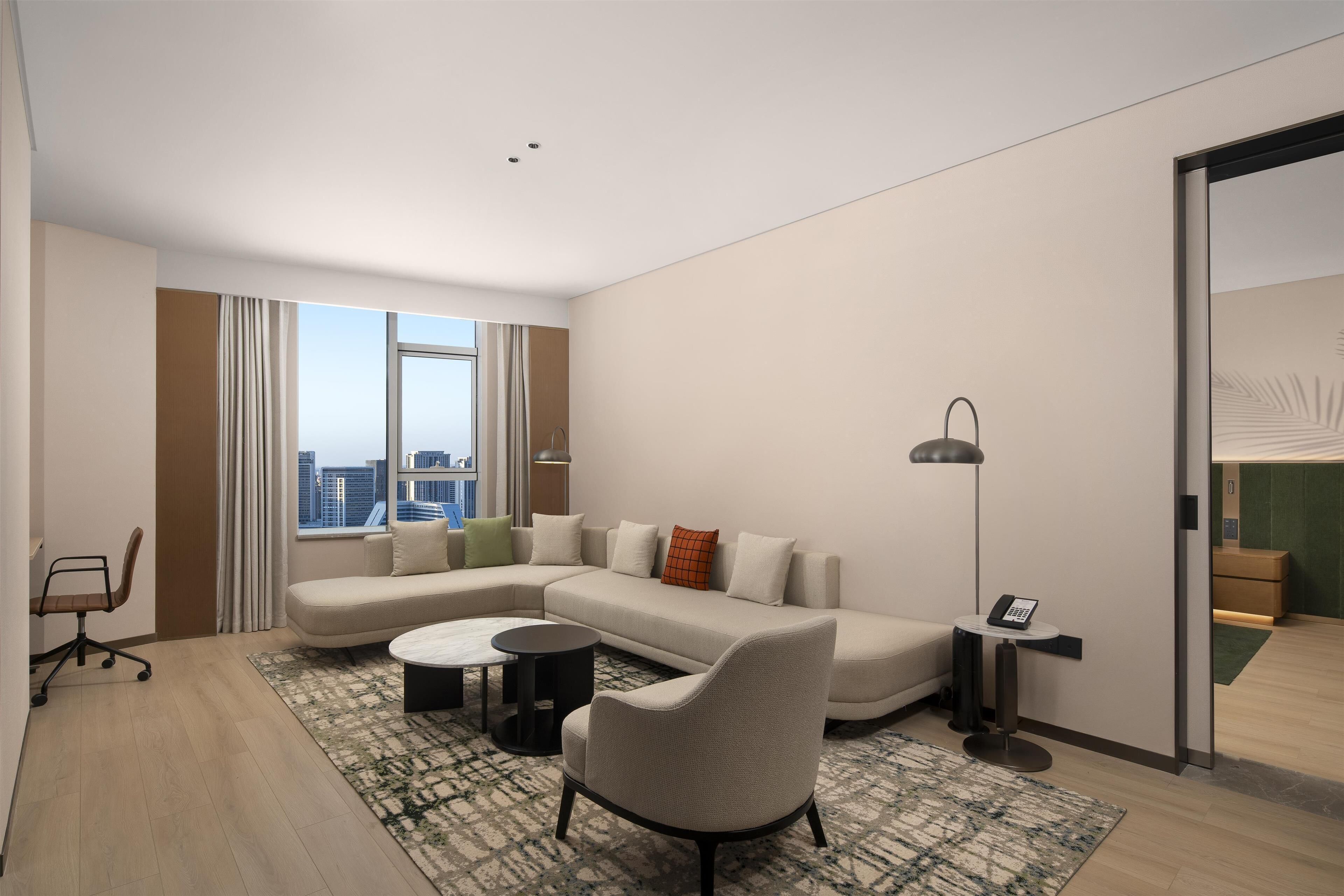 Deluxe Suite, 1 King Bed | Living area