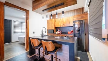 Habitación Deluxe, vista a la bahía | Cocina privada