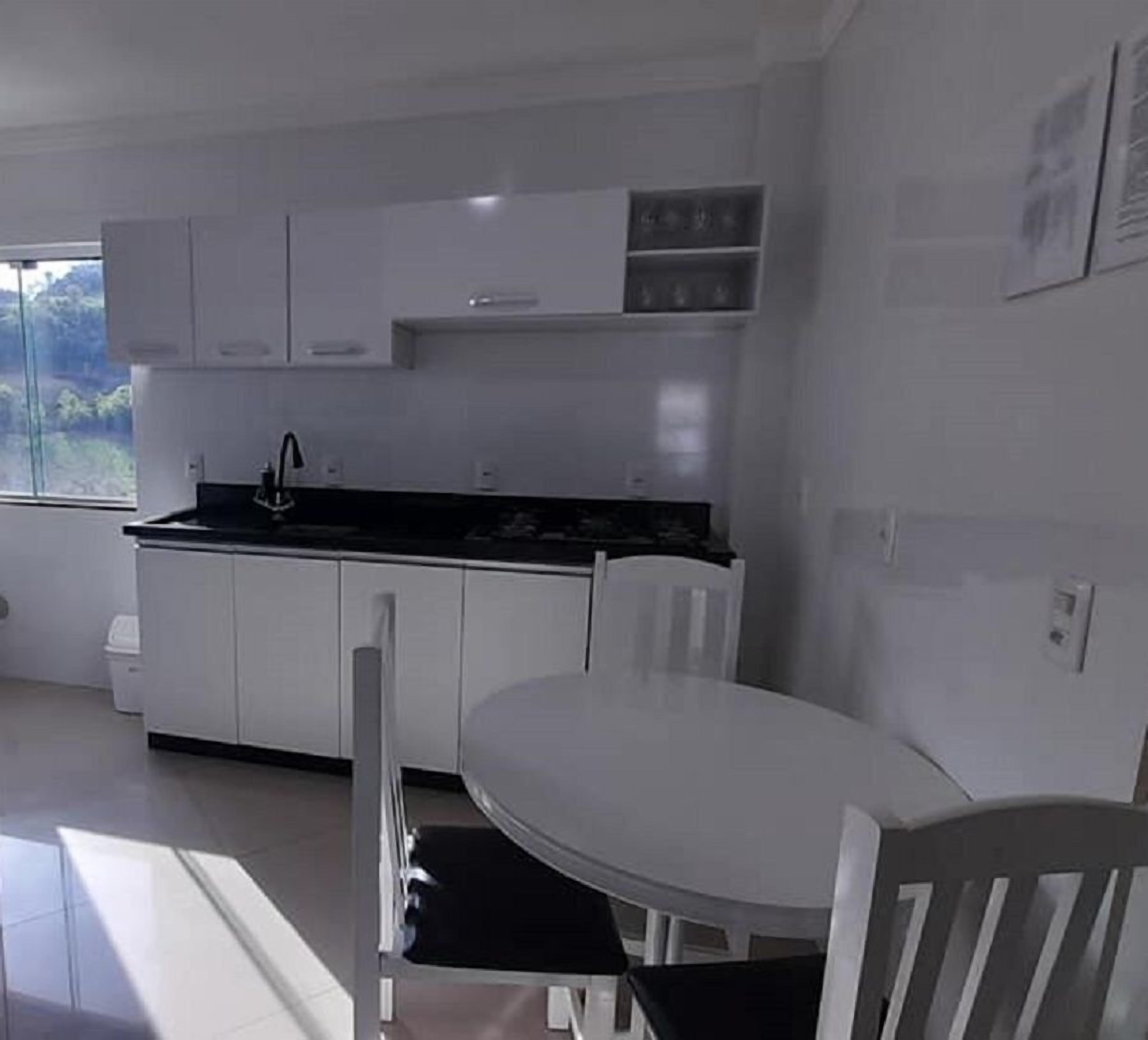 Apartamento standard | Cozinha privada | Geladeira, micro-ondas, fogão, cooktop