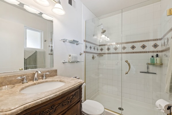 Shower, hair dryer, towels, soap