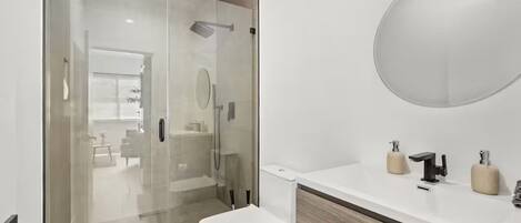 Shower, hair dryer, towels, soap