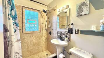 Shower, hair dryer, towels, soap