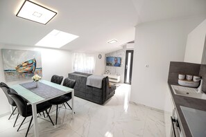 Apartment, 1 Bedroom, Non Smoking, Balcony | Living area | Flat-screen TV