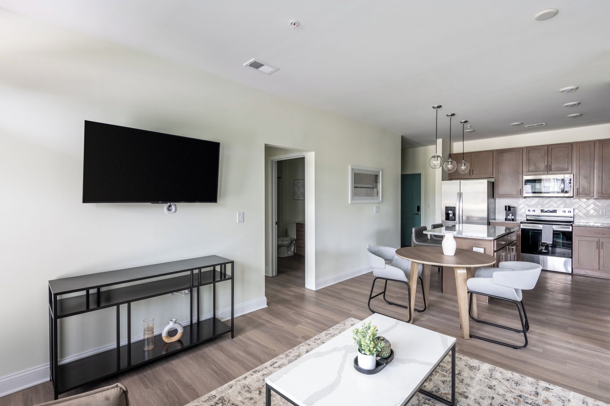 Apartment, 2 Bedrooms | Living area | 50-inch TV with digital channels