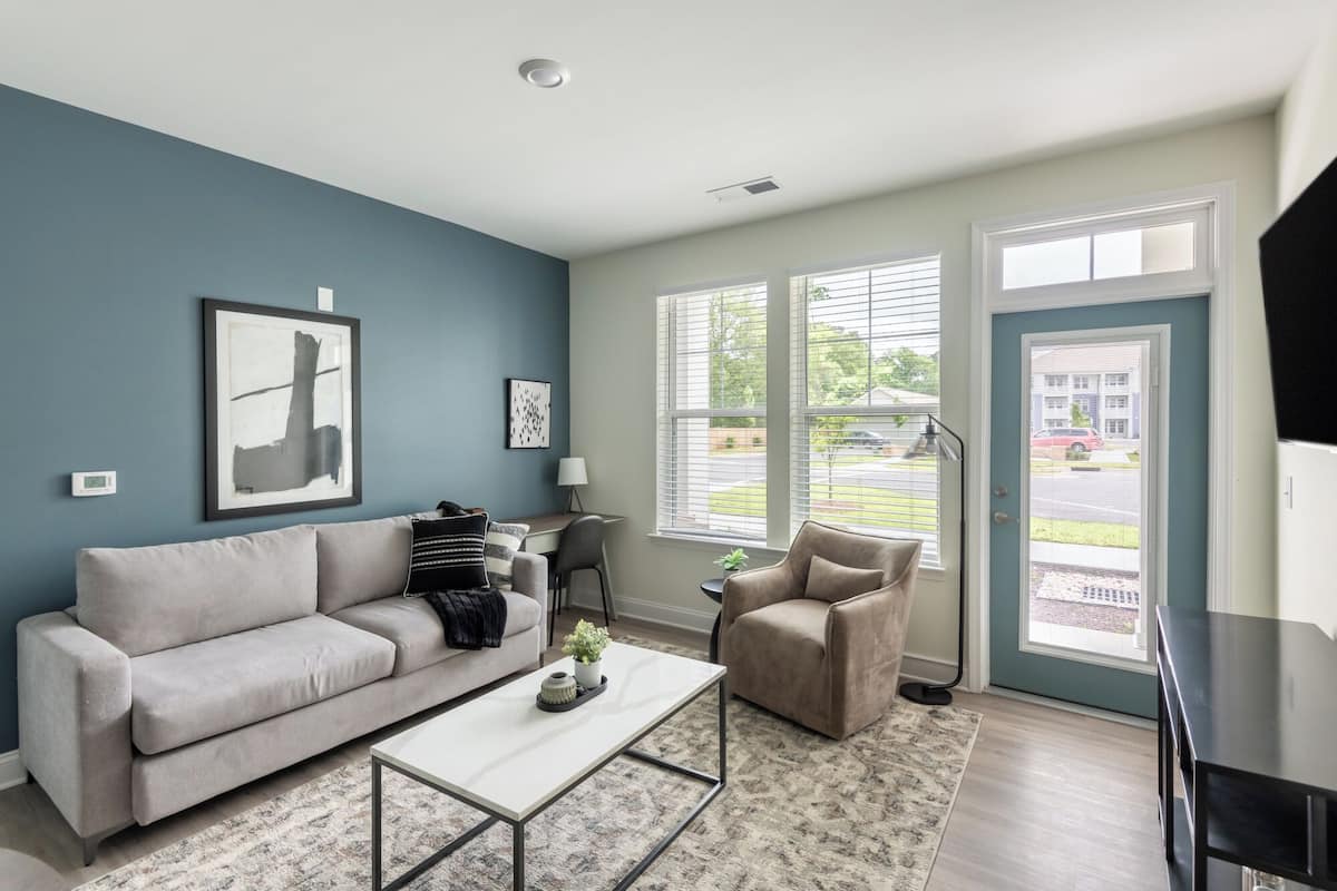 Apartment, 2 Bedrooms | Living area | 50-inch TV with digital channels