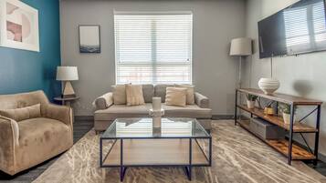 Apartment, 4 Bedrooms | Living area | TV