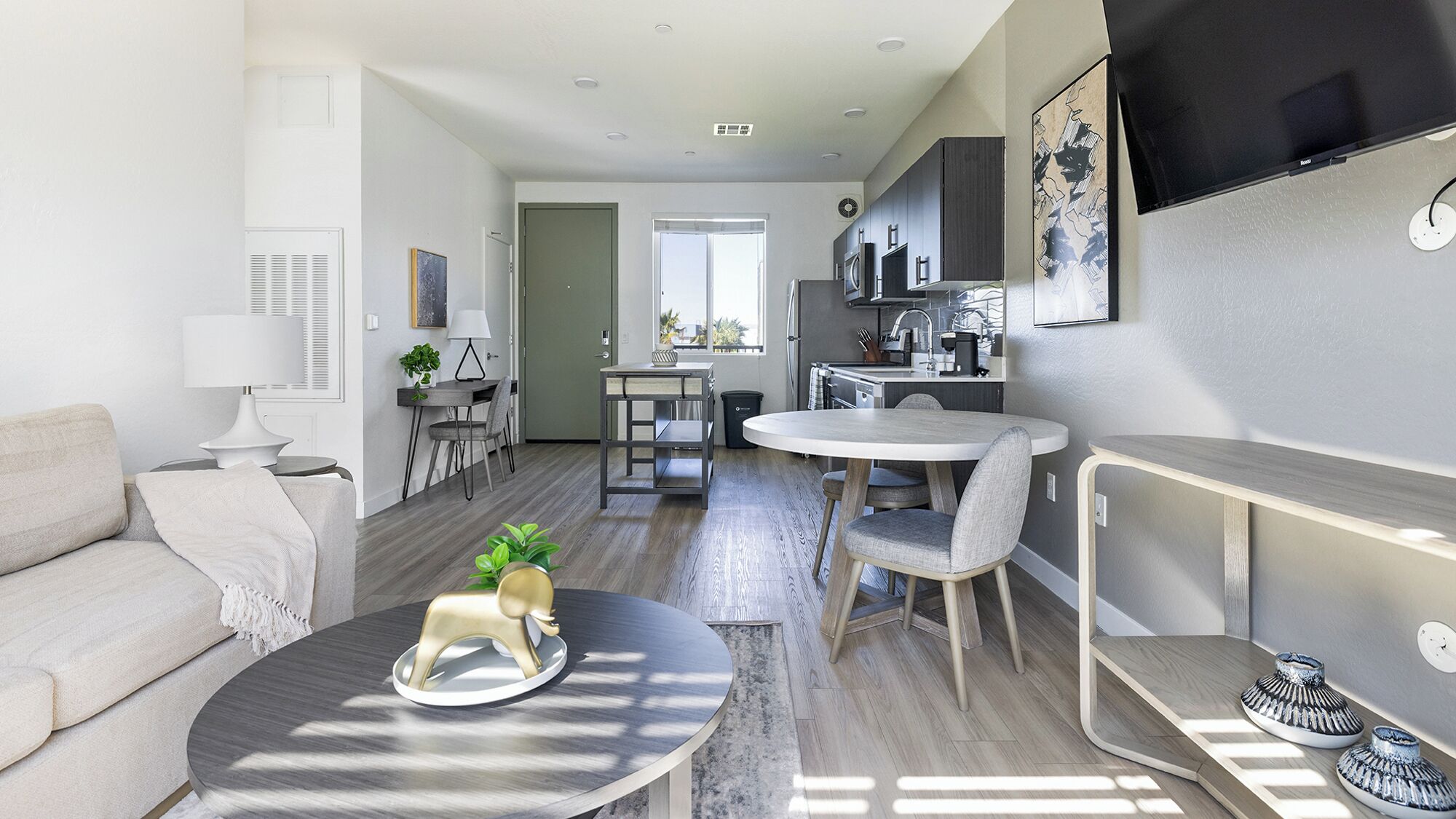 Apartment, 1 Bedroom | Living area | 50-inch TV with digital channels