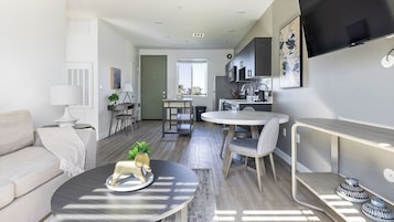 Apartment, 1 Bedroom | Living area | 50-inch Smart TV with digital channels