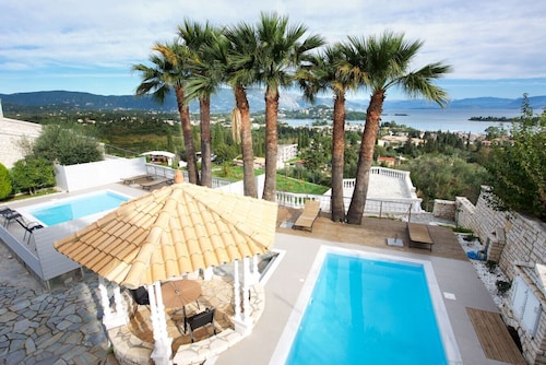 Spacious villa with stunning sea views in Gouvia near Corfu Town, great for multigenerational travel