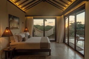 Suite Tapi | Sengetøy av topp kvalitet, minibar, safe på rommet og blendingsgardiner