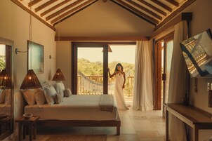 Suite Tapi | 高档床上用品、迷你吧、客房内保险箱、遮光窗帘