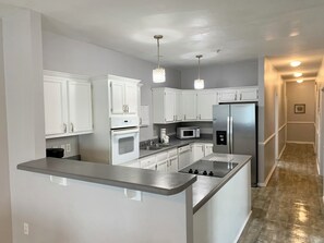 Microwave, oven, stovetop, dishwasher - Ocean Sand Beach Villa  7 Bedroom Townhome  Sleeps 20 (North Myrtle Beach)