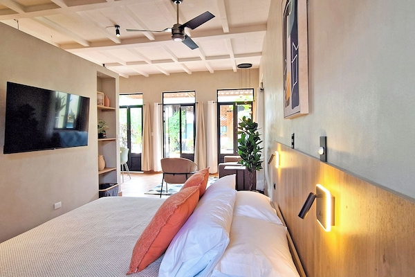 Comfort Studio Suite, Pool View | In-room safe, desk, free WiFi
