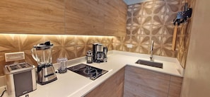 Fridge, microwave, stovetop, cookware/dishes/utensils