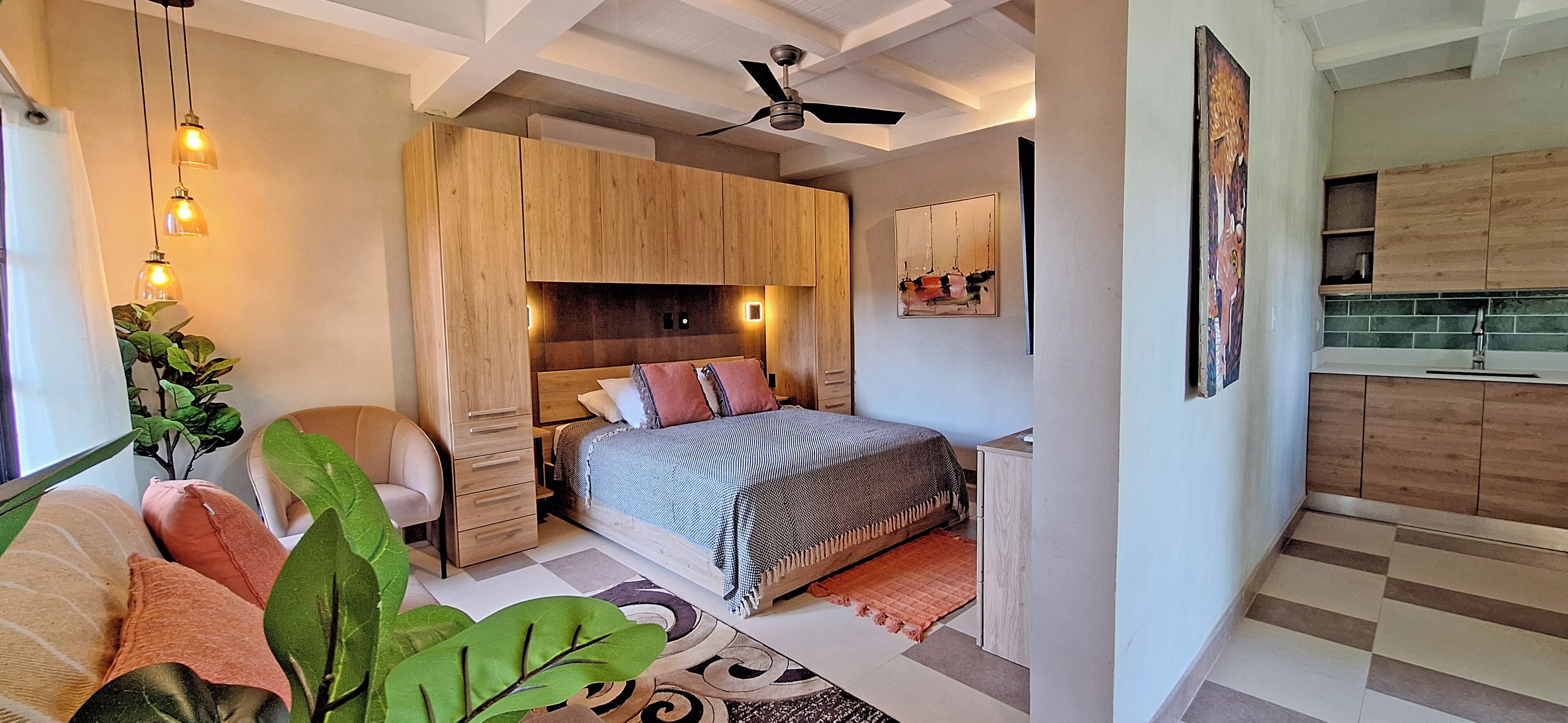 Junior Suite, Garden View | In-room safe, desk, free WiFi