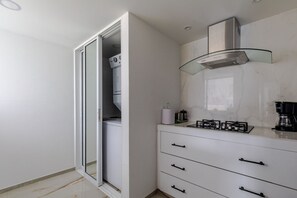 Fridge, microwave, stovetop, coffee/tea maker
