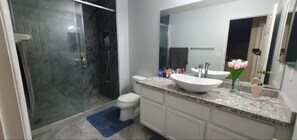 Shower, hair dryer, towels, soap