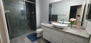 Shower, hair dryer, towels, soap
