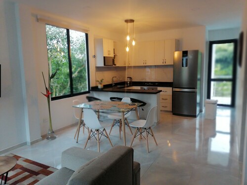 Three-bedroom country deluxe apartment with jacuzzi and balcony with a view.