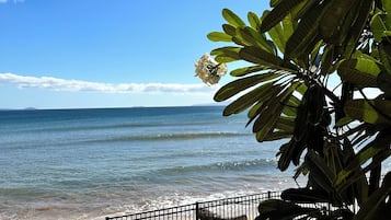 On the beach, sun loungers, beach towels
