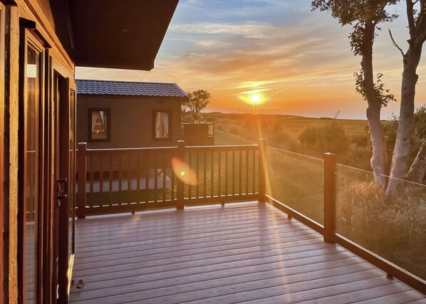 Terrace/patio - Bay view lodge offers just that, breathtaking views of Ceredigion Bay. (Llanon)