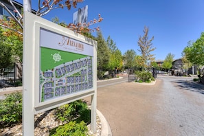 A signboard with a map of a residential area, including a labeled "TOWNHOUSE" section.