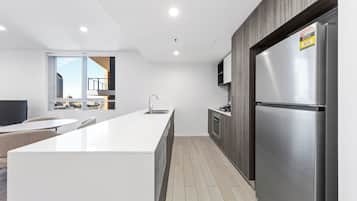 Two Bedroom Two Bathroom Apartment | Private kitchen | Fridge, microwave, oven, stovetop