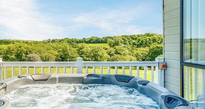 Escape to the Jasmine Lodge, nestled amidst stunning rolling countryside.