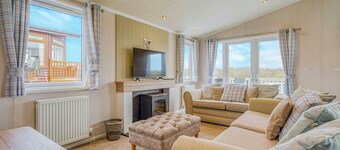 Escape to the Jasmine Lodge, nestled amidst stunning rolling countryside.