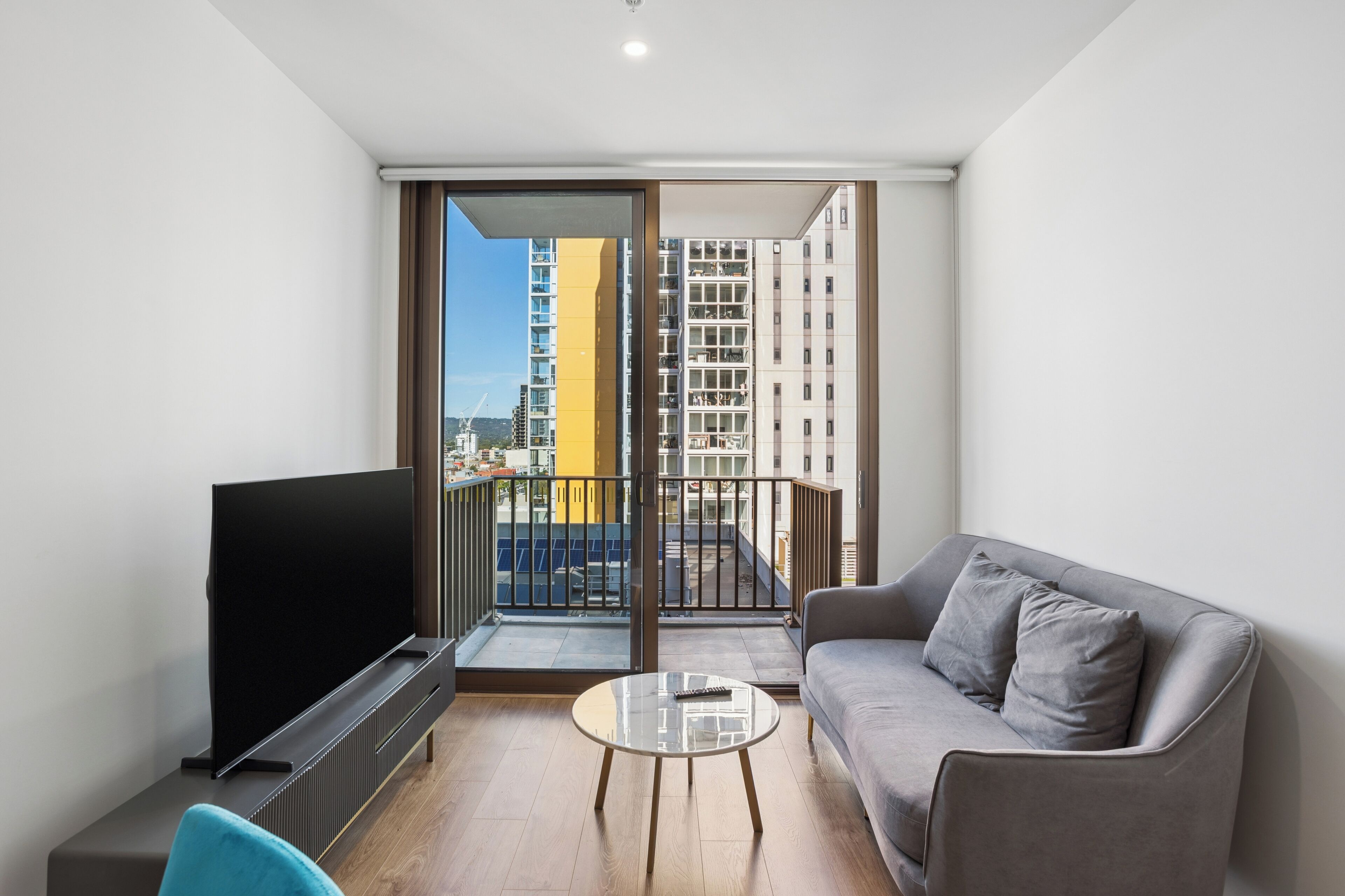 One Bedroom Apartment | Living area | 24-inch flat-screen TV with cable channels