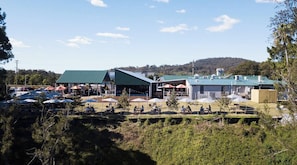 Enjoy outdoor dining with seating under umbrellas at this restaurant.