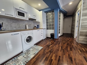 Fridge, microwave, coffee/tea maker, toaster