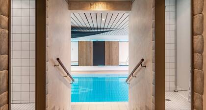 Ferienwohnung 'Brünnstein-Zimmer 46' mit Pool, Gemeinschaftsgarten und Sauna