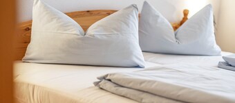 Appartement 'Brünnstein-Chambre 11' avec piscine, jardin commun et sauna