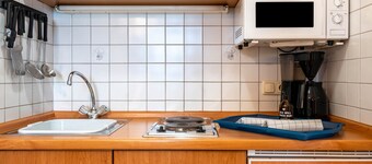 Holiday Apartment 'Brünnstein-Zimmer 11' with Pool, Shared Garden and Sauna
