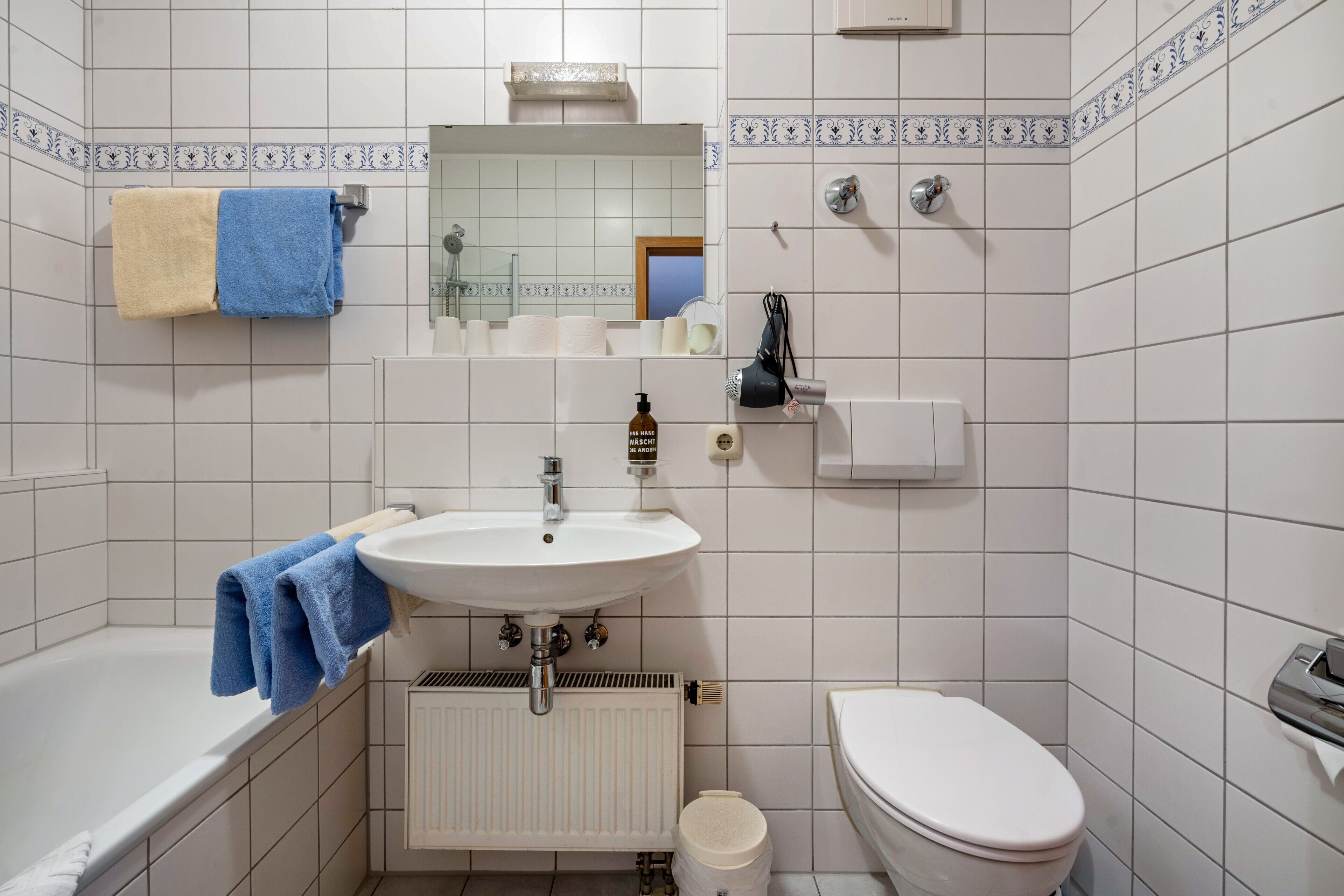 Ducha, secador de pelo, toallas