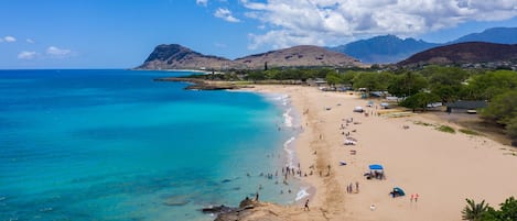 Sun loungers, beach umbrellas, beach towels