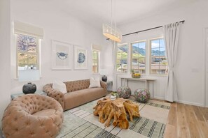 House (4 Bedrooms) | Living area | 43-inch flat-screen TV with cable channels, foosball - @ Marbella Lane - Paradise Point Close to Beaches (Waianae)