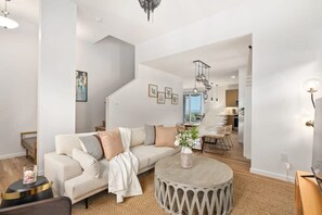 Family Suite (4 Bedrooms) | Living area | 43-inch flat-screen TV with cable channels, foosball - @ Marbella Lane - Pōmaika'i Ocean Love Paradise (Waianae)