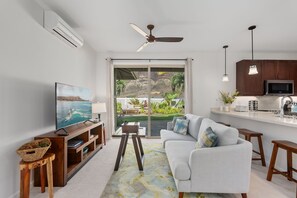 Romantic House (4 Bedrooms) | Living area | 43-inch flat-screen TV with cable channels, foosball - @ Marbella Lane - Pōmaika'i Ocean Love Paradise (Waianae)