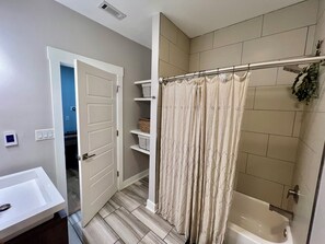Shower, towels, soap, shampoo