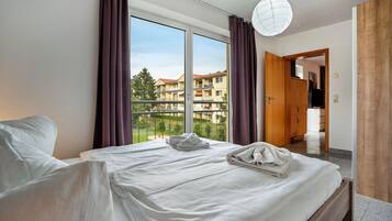 2 slaapkamers, een strijkplank/strijkijzer, gratis wifi, beddengoed