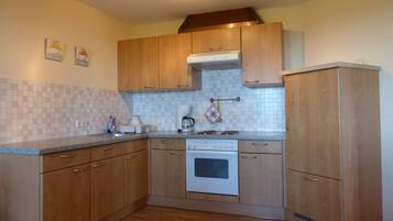 Fridge, coffee/tea maker, electric kettle, toaster