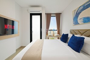 Apartemen, 1 kamar tidur, pemandangan kota | 1 kamar tidur, setrika/meja setrika, dan Wi-Fi gratis