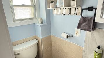 Shower, towels, soap, toilet paper